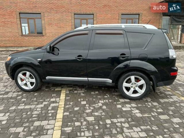Черный Мицубиси Аутлендер, объемом двигателя 3 л и пробегом 200 тыс. км за 7999 $, фото 9 на Automoto.ua