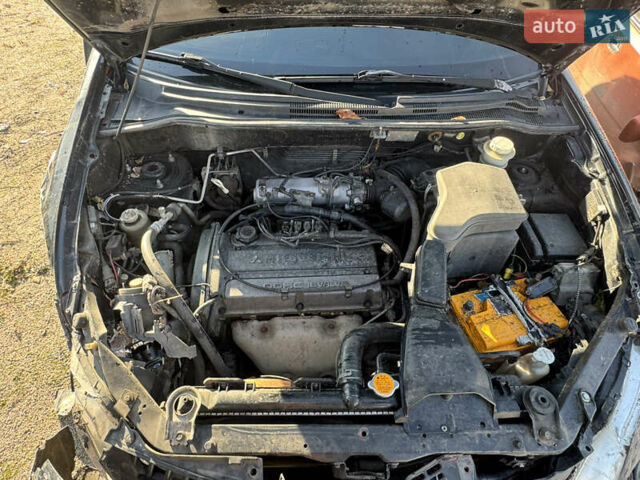 Черный Мицубиси Аутлендер, объемом двигателя 2 л и пробегом 258 тыс. км за 2200 $, фото 22 на Automoto.ua