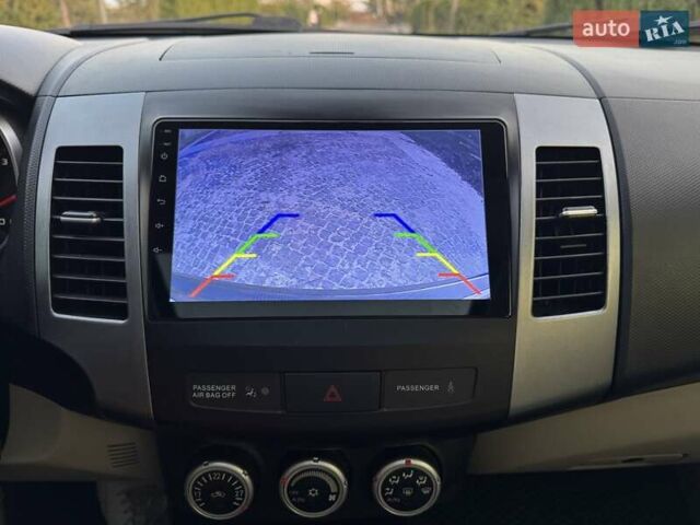 Черный Мицубиси Аутлендер, объемом двигателя 3 л и пробегом 205 тыс. км за 11300 $, фото 33 на Automoto.ua