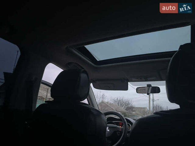 Черный Мицубиси Аутлендер, объемом двигателя 3 л и пробегом 265 тыс. км за 9200 $, фото 17 на Automoto.ua