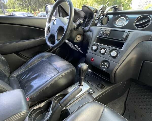 Черный Мицубиси Аутлендер, объемом двигателя 2.38 л и пробегом 310 тыс. км за 7500 $, фото 12 на Automoto.ua