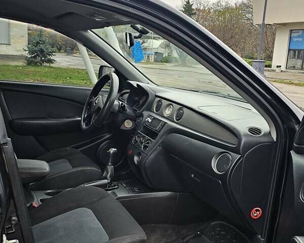 Чорний Міцубісі Аутлендер, об'ємом двигуна 2 л та пробігом 290 тис. км за 5000 $, фото 13 на Automoto.ua