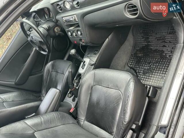 Чорний Міцубісі Аутлендер, об'ємом двигуна 2.4 л та пробігом 213 тис. км за 6850 $, фото 20 на Automoto.ua