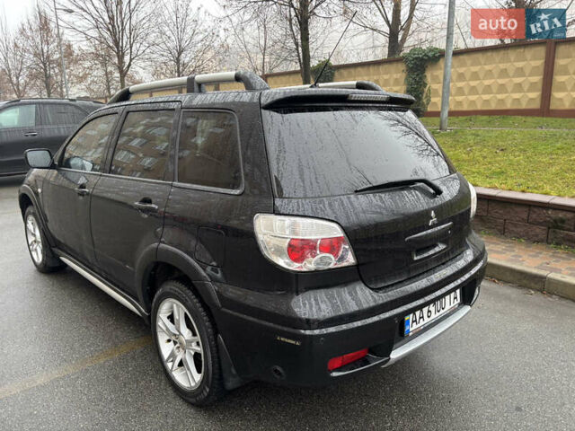 Чорний Міцубісі Аутлендер, об'ємом двигуна 2.4 л та пробігом 169 тис. км за 8000 $, фото 16 на Automoto.ua