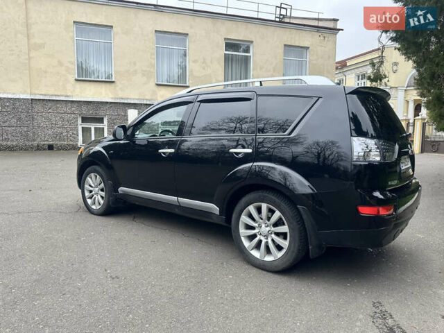 Чорний Міцубісі Аутлендер, об'ємом двигуна 2.4 л та пробігом 230 тис. км за 8300 $, фото 5 на Automoto.ua