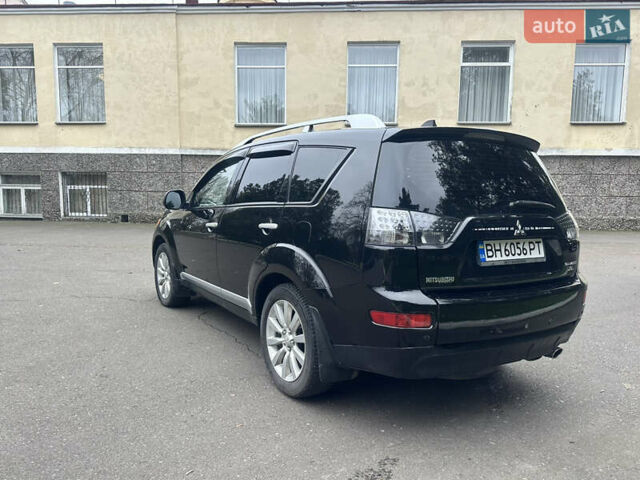 Чорний Міцубісі Аутлендер, об'ємом двигуна 2.4 л та пробігом 230 тис. км за 8300 $, фото 7 на Automoto.ua