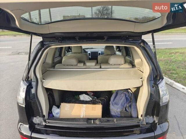 Черный Мицубиси Аутлендер, объемом двигателя 3 л и пробегом 155 тыс. км за 9800 $, фото 22 на Automoto.ua