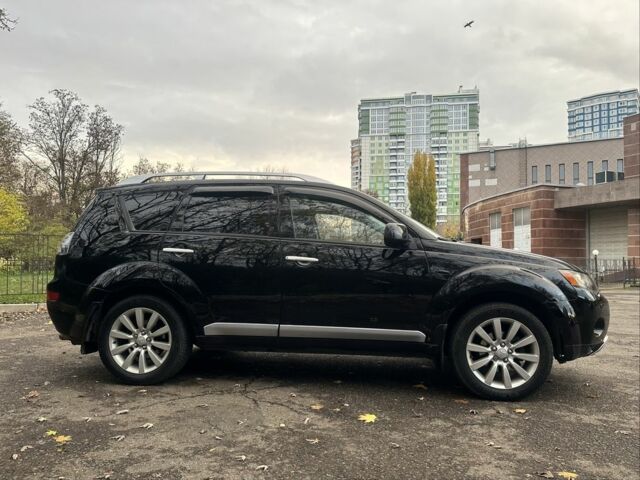 Черный Мицубиси Аутлендер, объемом двигателя 2.4 л и пробегом 230 тыс. км за 8500 $, фото 8 на Automoto.ua