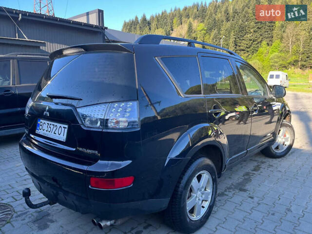 Чорний Міцубісі Аутлендер, об'ємом двигуна 2 л та пробігом 330 тис. км за 7500 $, фото 3 на Automoto.ua