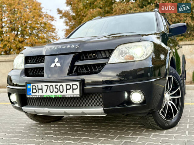 Міцубісі Аутлендер 2007 у Одесі на Automoto.ua Чорний Міцубісі Аутлендер, об'ємом двигуна 2.4 л та пробігом 201 тис. км за 7700 $, фото 36 на Automoto.ua