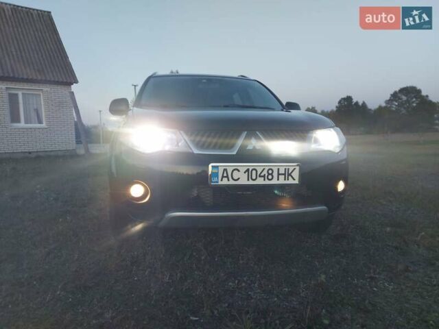 Чорний Міцубісі Аутлендер, об'ємом двигуна 2 л та пробігом 330 тис. км за 9100 $, фото 11 на Automoto.ua