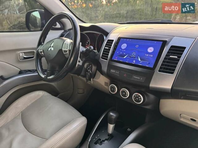Черный Мицубиси Аутлендер, объемом двигателя 3 л и пробегом 205 тыс. км за 11300 $, фото 15 на Automoto.ua