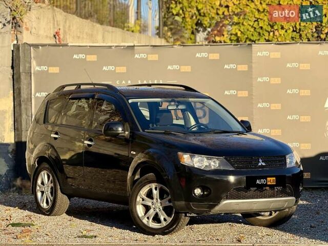 Черный Мицубиси Аутлендер, объемом двигателя 3 л и пробегом 198 тыс. км за 9500 $, фото 1 на Automoto.ua