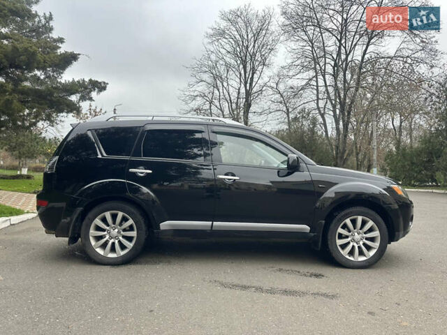 Чорний Міцубісі Аутлендер, об'ємом двигуна 2.4 л та пробігом 230 тис. км за 8300 $, фото 13 на Automoto.ua