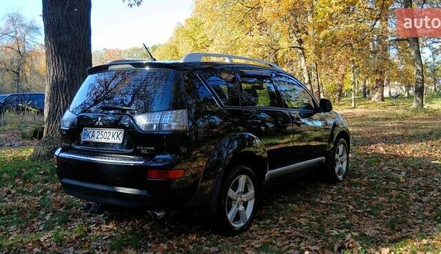 Міцубісі Аутлендер 2007 у Белой Церкве на Automoto.ua Чорний Міцубісі Аутлендер, об'ємом двигуна 3 л та пробігом 230 тис. км за 8800 $, фото 4 на Automoto.ua