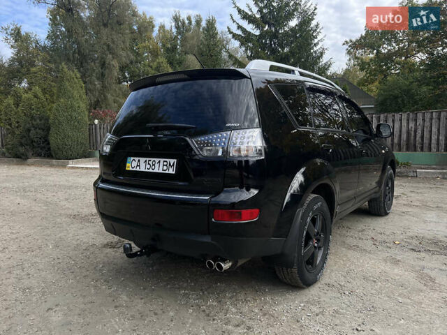 Чорний Міцубісі Аутлендер, об'ємом двигуна 3 л та пробігом 137 тис. км за 9800 $, фото 6 на Automoto.ua