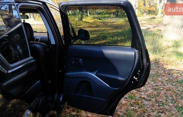 Міцубісі Аутлендер 2007 у Белой Церкве на Automoto.ua Чорний Міцубісі Аутлендер, об'ємом двигуна 3 л та пробігом 230 тис. км за 8800 $, фото 11 на Automoto.ua