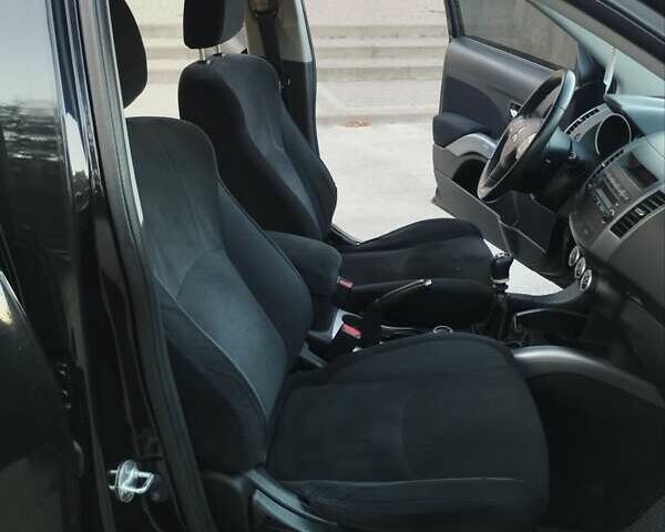 Черный Мицубиси Аутлендер, объемом двигателя 2 л и пробегом 312 тыс. км за 7500 $, фото 11 на Automoto.ua