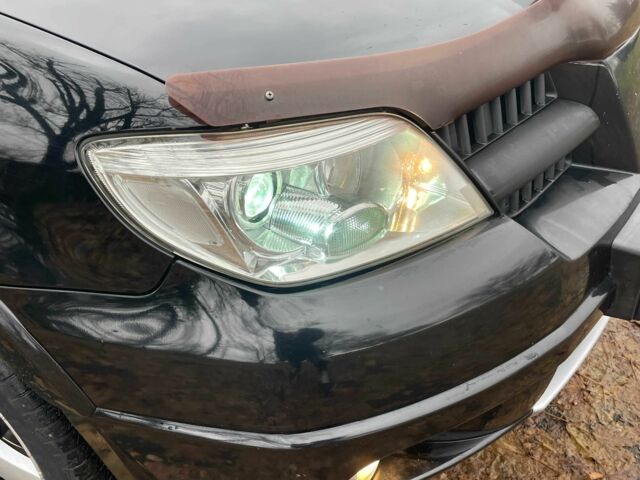 Черный Мицубиси Аутлендер, объемом двигателя 2.4 л и пробегом 213 тыс. км за 6850 $, фото 11 на Automoto.ua