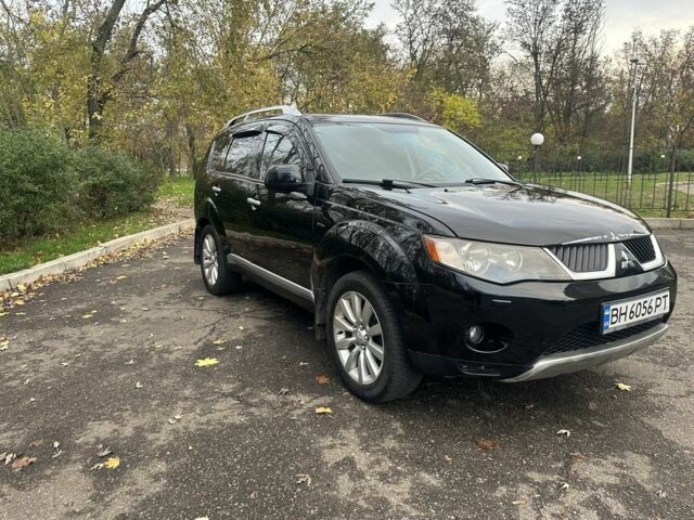 Черный Мицубиси Аутлендер, объемом двигателя 2.4 л и пробегом 230 тыс. км за 8500 $, фото 9 на Automoto.ua