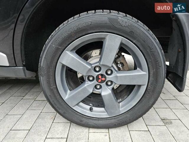 Черный Мицубиси Аутлендер, объемом двигателя 3 л и пробегом 238 тыс. км за 10800 $, фото 12 на Automoto.ua