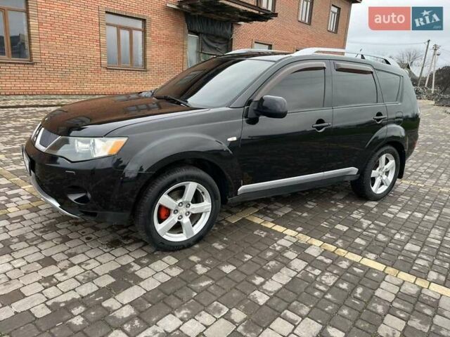 Черный Мицубиси Аутлендер, объемом двигателя 3 л и пробегом 200 тыс. км за 7999 $, фото 10 на Automoto.ua