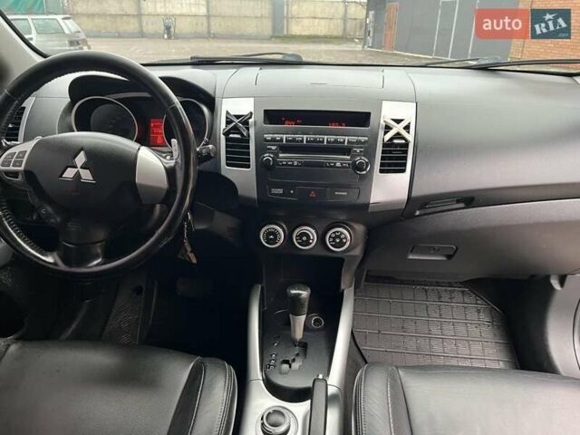 Черный Мицубиси Аутлендер, объемом двигателя 3 л и пробегом 200 тыс. км за 7999 $, фото 22 на Automoto.ua