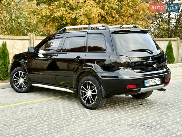 Міцубісі Аутлендер 2007 у Одесі на Automoto.ua Чорний Міцубісі Аутлендер, об'ємом двигуна 2.4 л та пробігом 201 тис. км за 7700 $, фото 21 на Automoto.ua