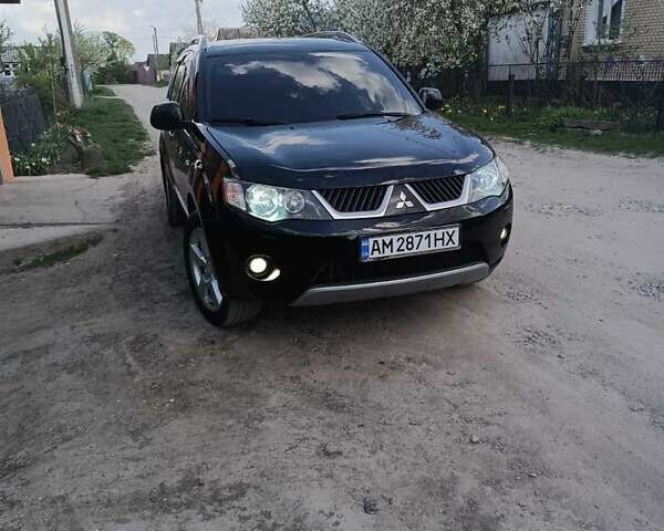Черный Мицубиси Аутлендер, объемом двигателя 3 л и пробегом 200 тыс. км за 7999 $, фото 3 на Automoto.ua
