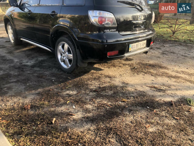 Черный Мицубиси Аутлендер, объемом двигателя 2.4 л и пробегом 260 тыс. км за 7200 $, фото 13 на Automoto.ua