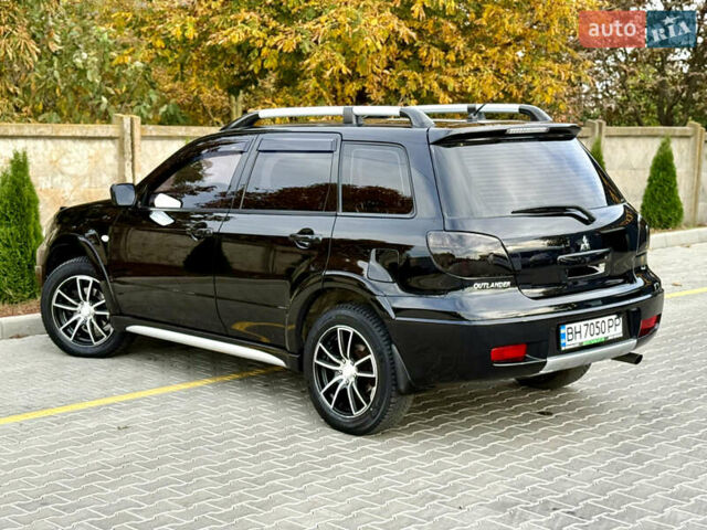 Міцубісі Аутлендер 2007 у Одесі на Automoto.ua Чорний Міцубісі Аутлендер, об'ємом двигуна 2.4 л та пробігом 201 тис. км за 7700 $, фото 22 на Automoto.ua