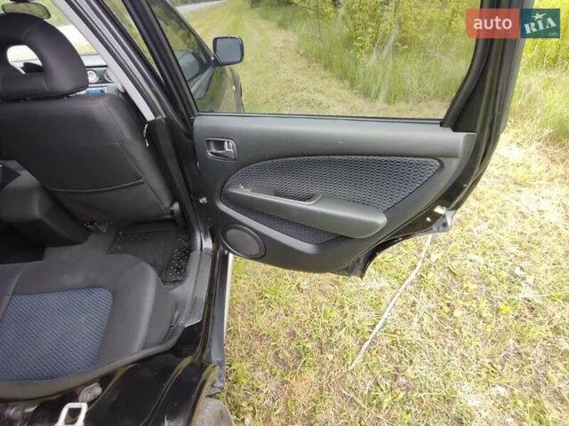 Черный Мицубиси Аутлендер, объемом двигателя 2 л и пробегом 172 тыс. км за 6900 $, фото 25 на Automoto.ua
