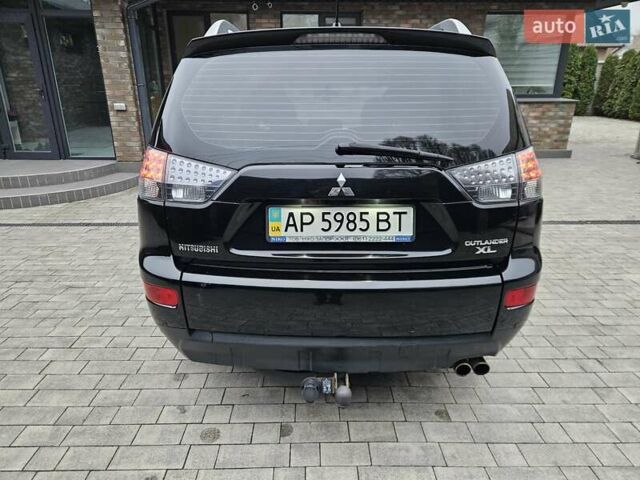 Черный Мицубиси Аутлендер, объемом двигателя 3 л и пробегом 238 тыс. км за 10800 $, фото 21 на Automoto.ua