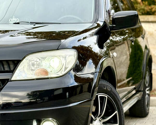 Міцубісі Аутлендер 2007 у Одесі на Automoto.ua Чорний Міцубісі Аутлендер, об'ємом двигуна 2.4 л та пробігом 201 тис. км за 7700 $, фото 34 на Automoto.ua