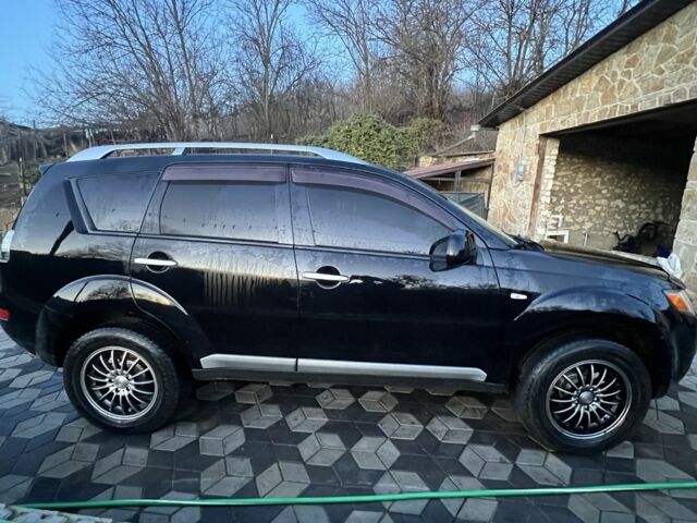 Черный Мицубиси Аутлендер, объемом двигателя 2 л и пробегом 288 тыс. км за 9200 $, фото 7 на Automoto.ua