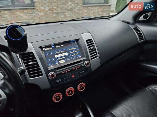 Черный Мицубиси Аутлендер, объемом двигателя 3 л и пробегом 238 тыс. км за 10800 $, фото 26 на Automoto.ua