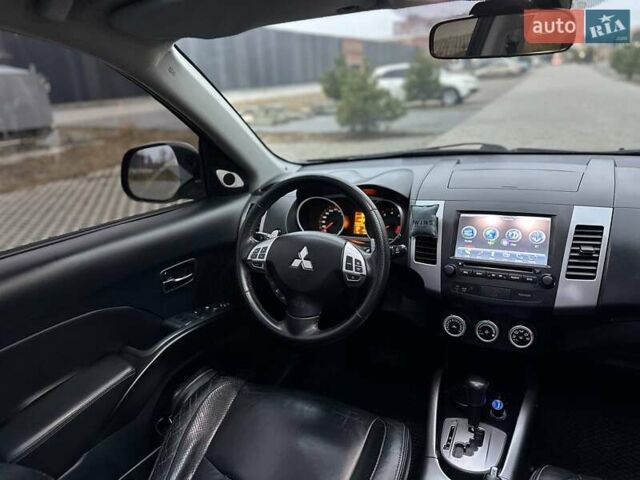 Черный Мицубиси Аутлендер, объемом двигателя 3 л и пробегом 248 тыс. км за 9800 $, фото 43 на Automoto.ua
