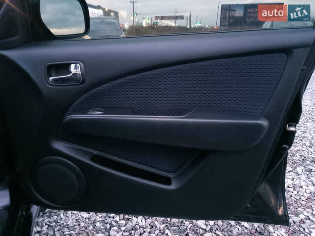 Чорний Міцубісі Аутлендер, об'ємом двигуна 2 л та пробігом 271 тис. км за 6940 $, фото 20 на Automoto.ua