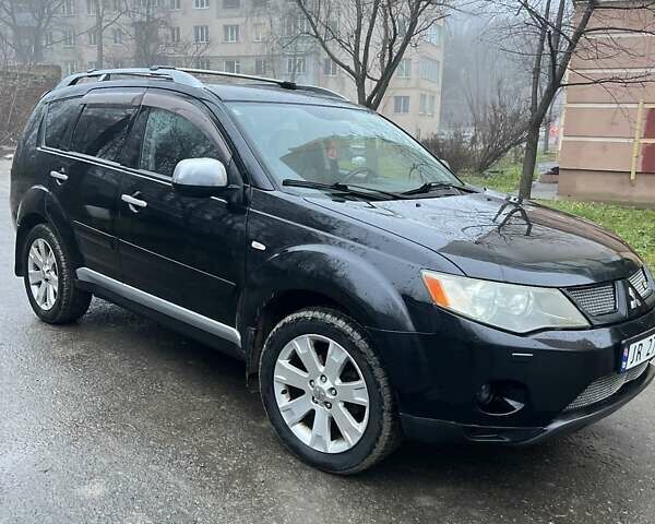 Чорний Міцубісі Аутлендер, об'ємом двигуна 2 л та пробігом 330 тис. км за 4900 $, фото 2 на Automoto.ua
