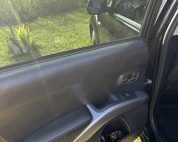 Черный Мицубиси Аутлендер, объемом двигателя 2.36 л и пробегом 240 тыс. км за 9599 $, фото 20 на Automoto.ua