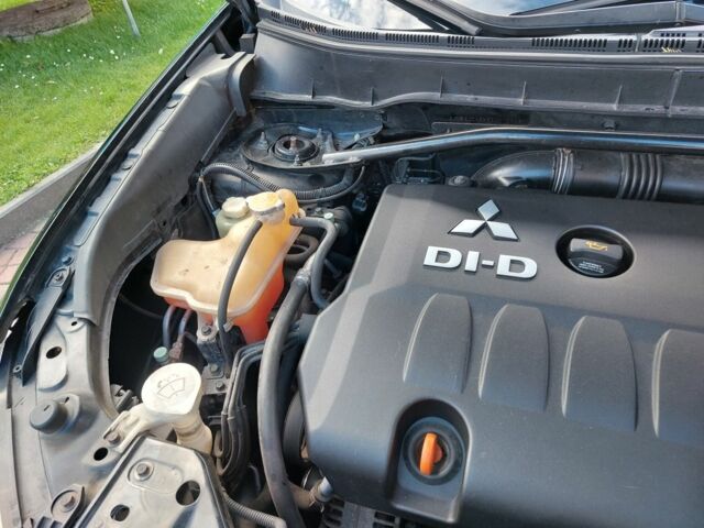 Черный Мицубиси Аутлендер, объемом двигателя 2 л и пробегом 249 тыс. км за 8750 $, фото 14 на Automoto.ua