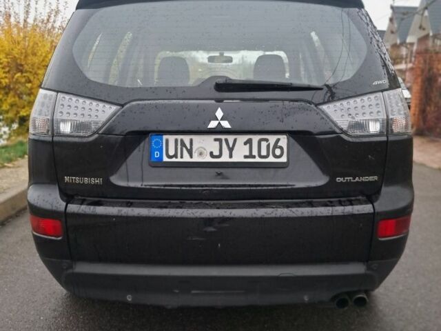 Черный Мицубиси Аутлендер, объемом двигателя 2 л и пробегом 226 тыс. км за 4700 $, фото 5 на Automoto.ua