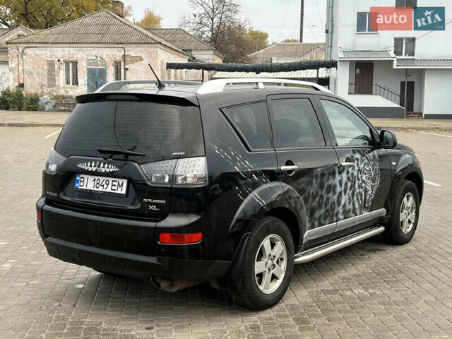 Мицубиси Аутлендер 2008 в Кременчуге на Automoto.ua Черный Мицубиси Аутлендер, объемом двигателя 2.4 л и пробегом 230 тыс. км за 6850 $, фото 23 на Automoto.ua