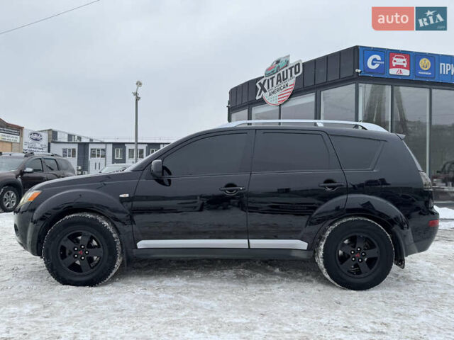 Черный Мицубиси Аутлендер, объемом двигателя 2.36 л и пробегом 240 тыс. км за 8999 $, фото 18 на Automoto.ua