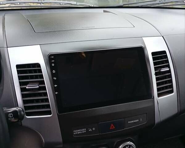 Чорний Міцубісі Аутлендер, об'ємом двигуна 2.36 л та пробігом 265 тис. км за 8800 $, фото 8 на Automoto.ua