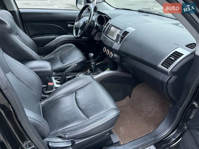 Черный Мицубиси Аутлендер, объемом двигателя 1.97 л и пробегом 244 тыс. км за 8800 $, фото 9 на Automoto.ua