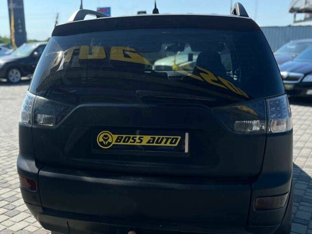 Черный Мицубиси Аутлендер, объемом двигателя 3 л и пробегом 308 тыс. км за 7600 $, фото 5 на Automoto.ua