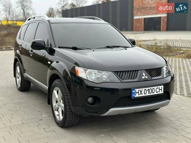 Черный Мицубиси Аутлендер, объемом двигателя 3 л и пробегом 248 тыс. км за 9800 $, фото 4 на Automoto.ua