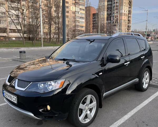 Черный Мицубиси Аутлендер, объемом двигателя 2.4 л и пробегом 237 тыс. км за 5000 $, фото 5 на Automoto.ua