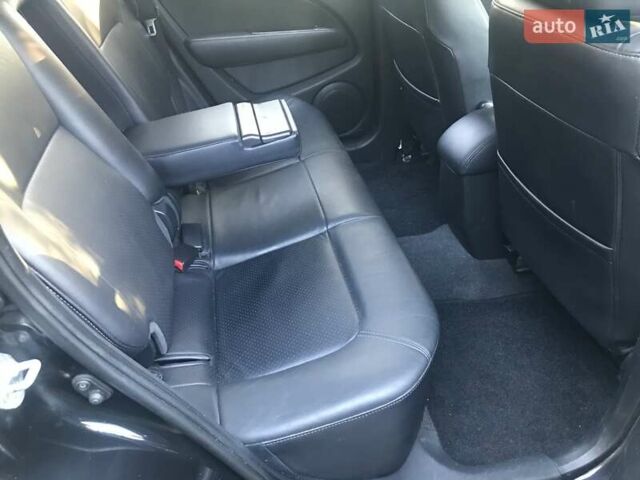 Чорний Міцубісі Аутлендер, об'ємом двигуна 2.38 л та пробігом 207 тис. км за 7000 $, фото 77 на Automoto.ua